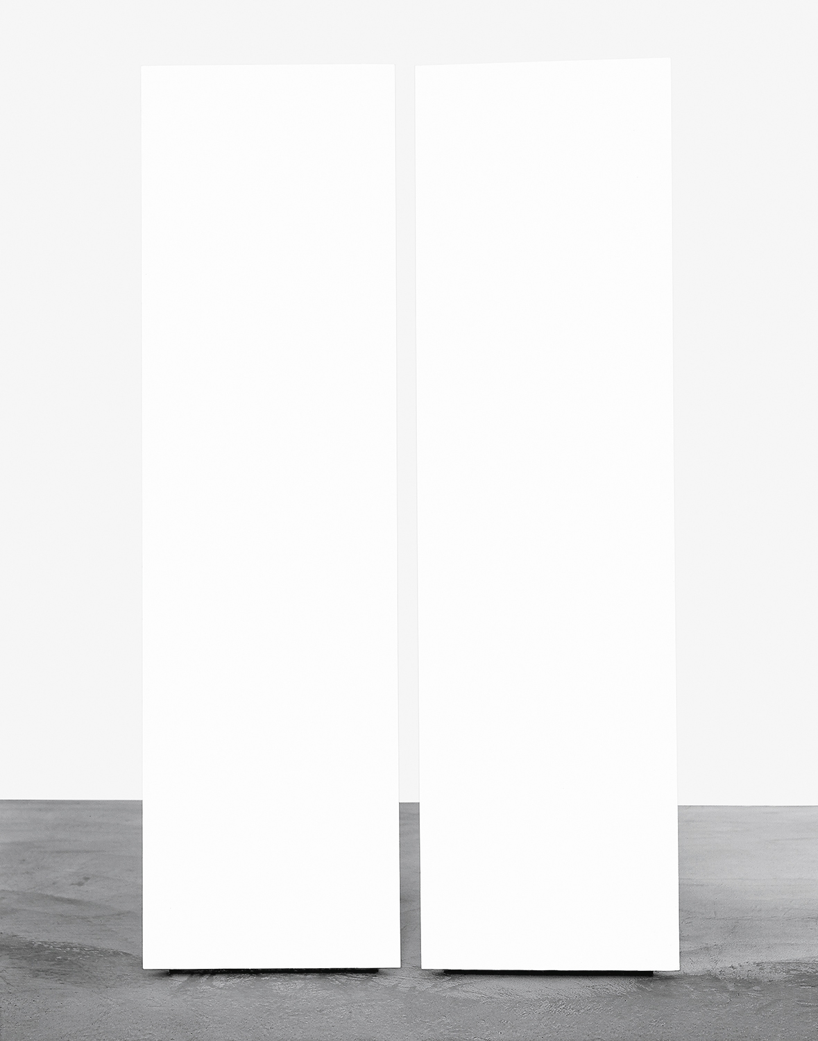 Mary Corse, Two Triangular Columns, 1965. Wood, joint compound, acrylic. 