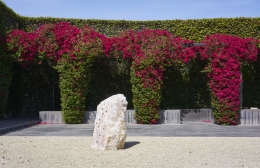 Installation view of Mika Tajima, Pranayama (Monolith, F, Rose Quartz), 2021, rock sculpture